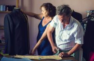 Mature couple working together in a tailoring shop