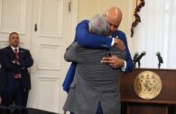 Maryland Gov Wes. Moore embraces Frank LaPere during a bill signing ceremony May 16, 2024, in Annapolis. Photo by William J. Ford.